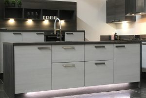 kuhl-kitchens-plan-range-in-white-oak-accented-with-grey-oak-wall-units-worktop-and-carcase-edging