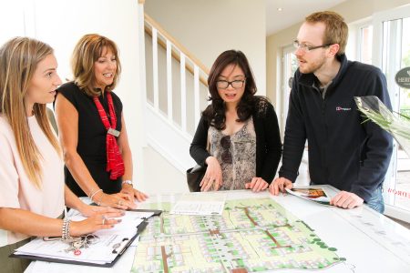 Redrow's Dionne Richards and Helen Pirie with Mai and Dan Cartwright