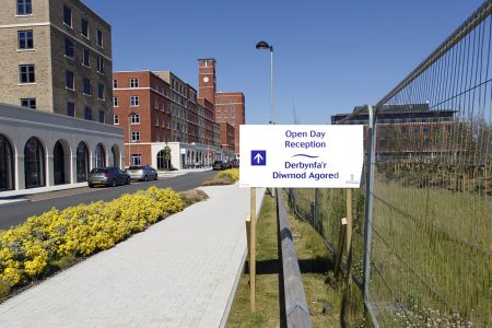 Swansea, UK: June 17, 2017: The magnificent new 65 acre Bay Campus is located right on the beach on the eastern approach to Swansea, and is the home to the College of Engineering and School of Management. Directional sign for the university open day.